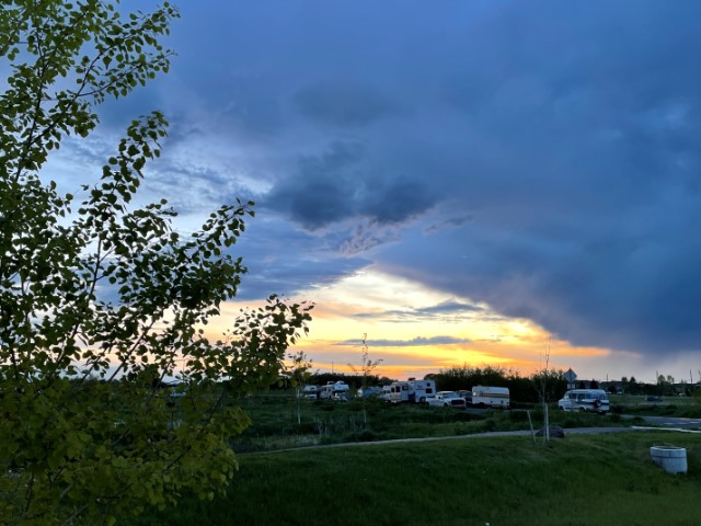 Sunset seen from a parking lot