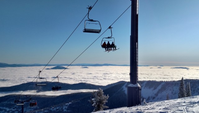 ski lift above the clouds